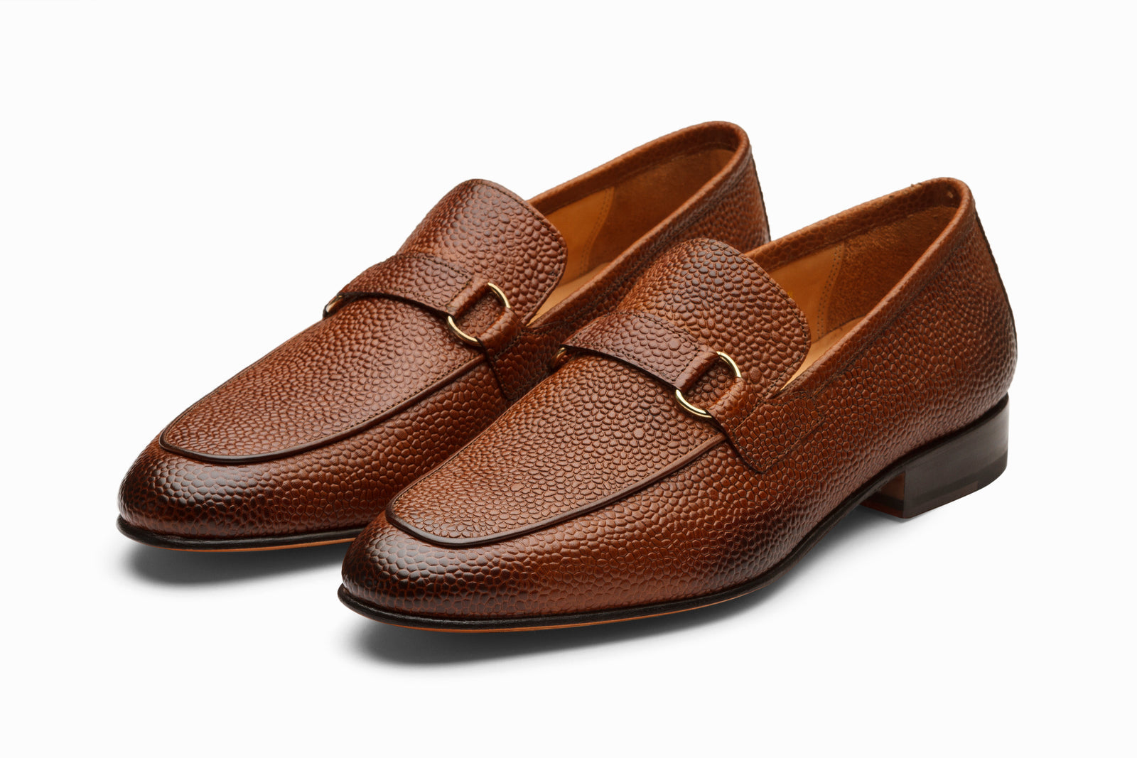 Brown leather loafer viewed in full