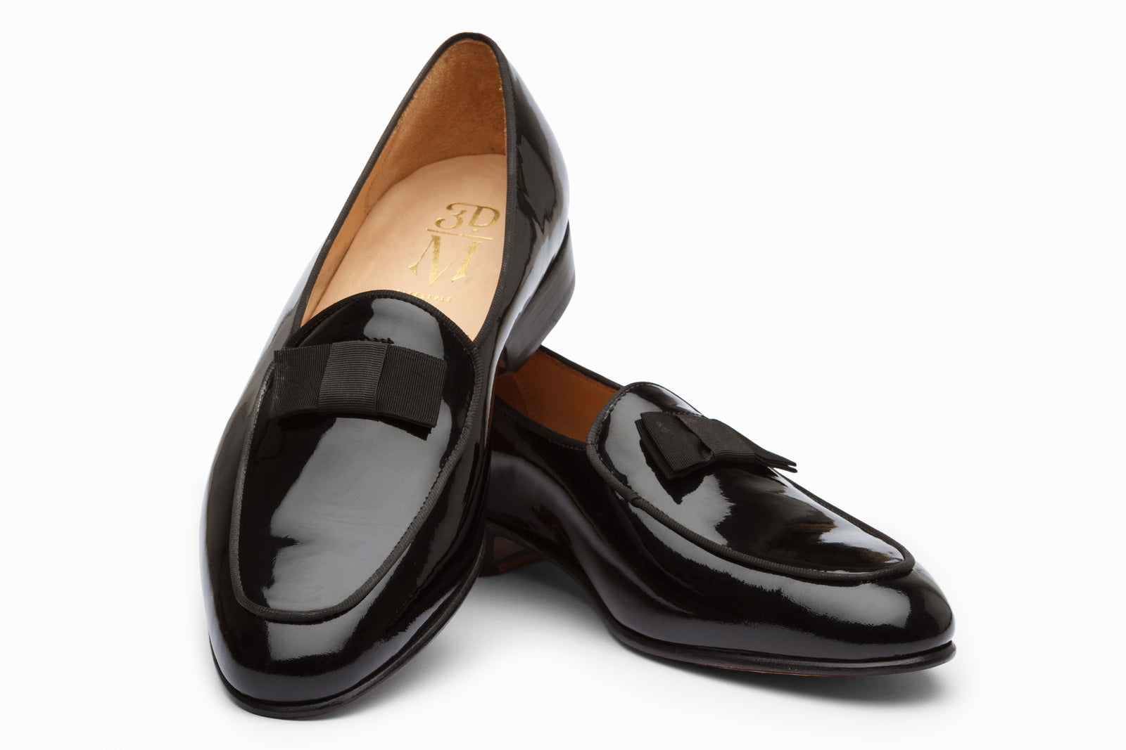 Close view of the black patent dress shoe