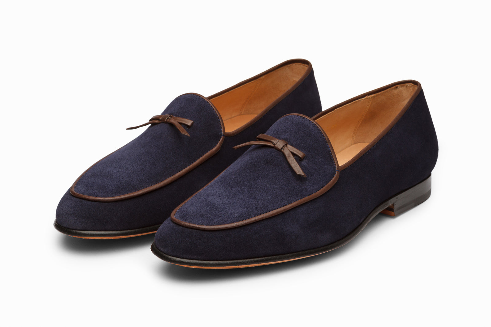 Navy suede loafer viewed in full