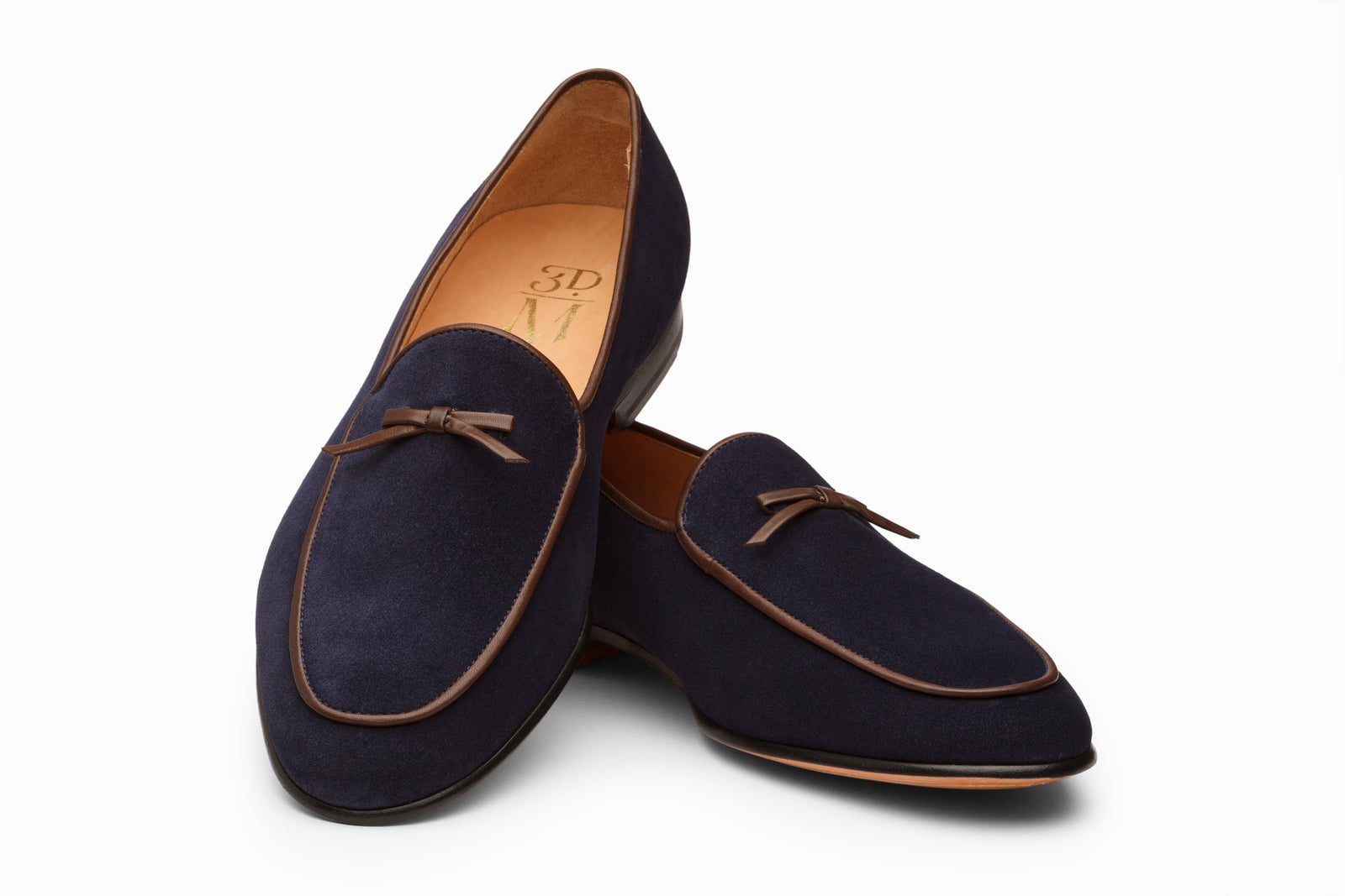Close view of the navy suede loafer
