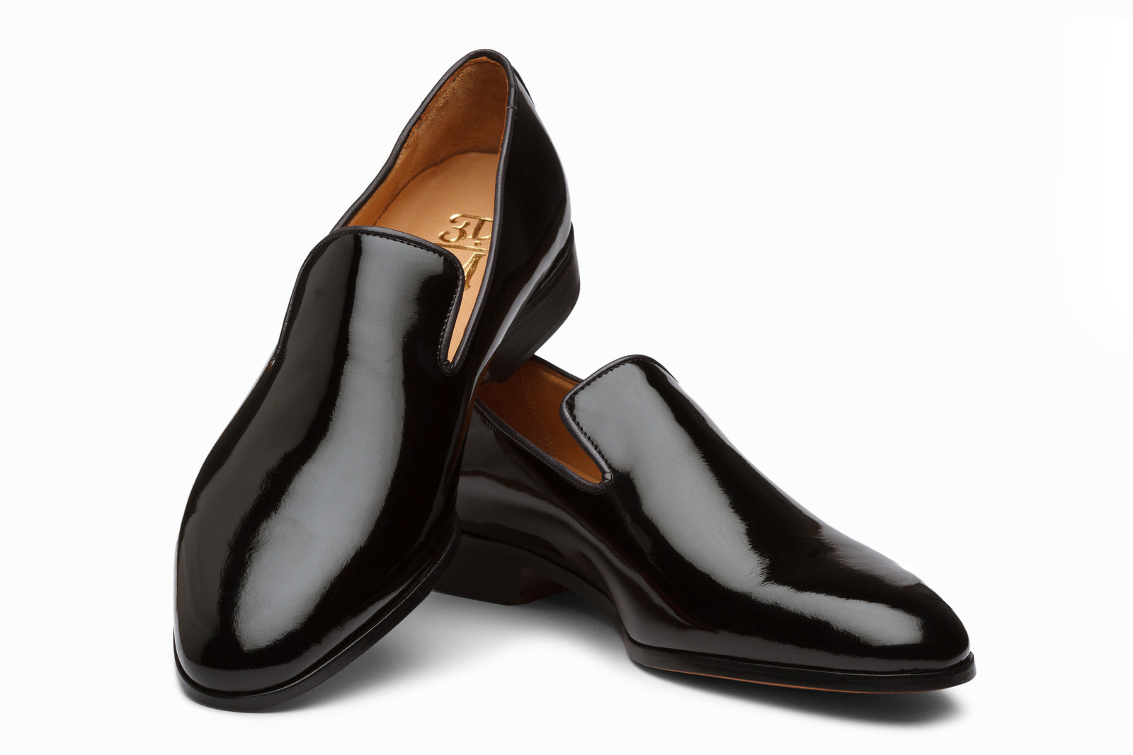 Close view of the black patent loafer