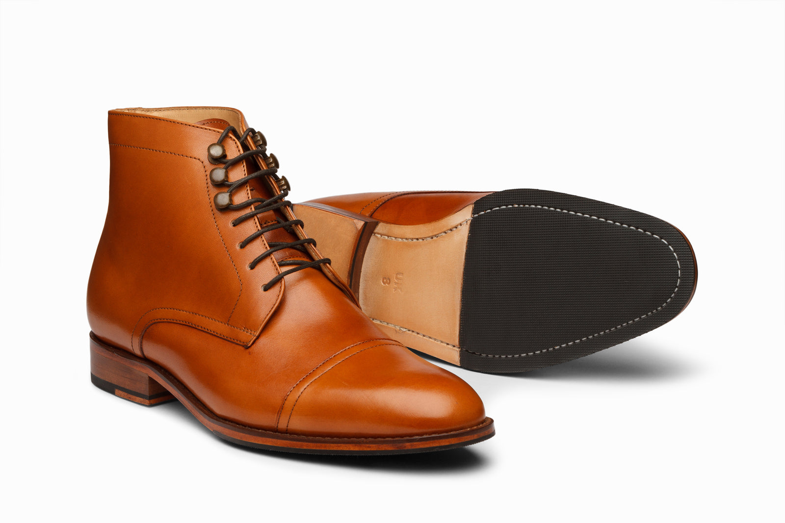 Close view of the tan leather boot