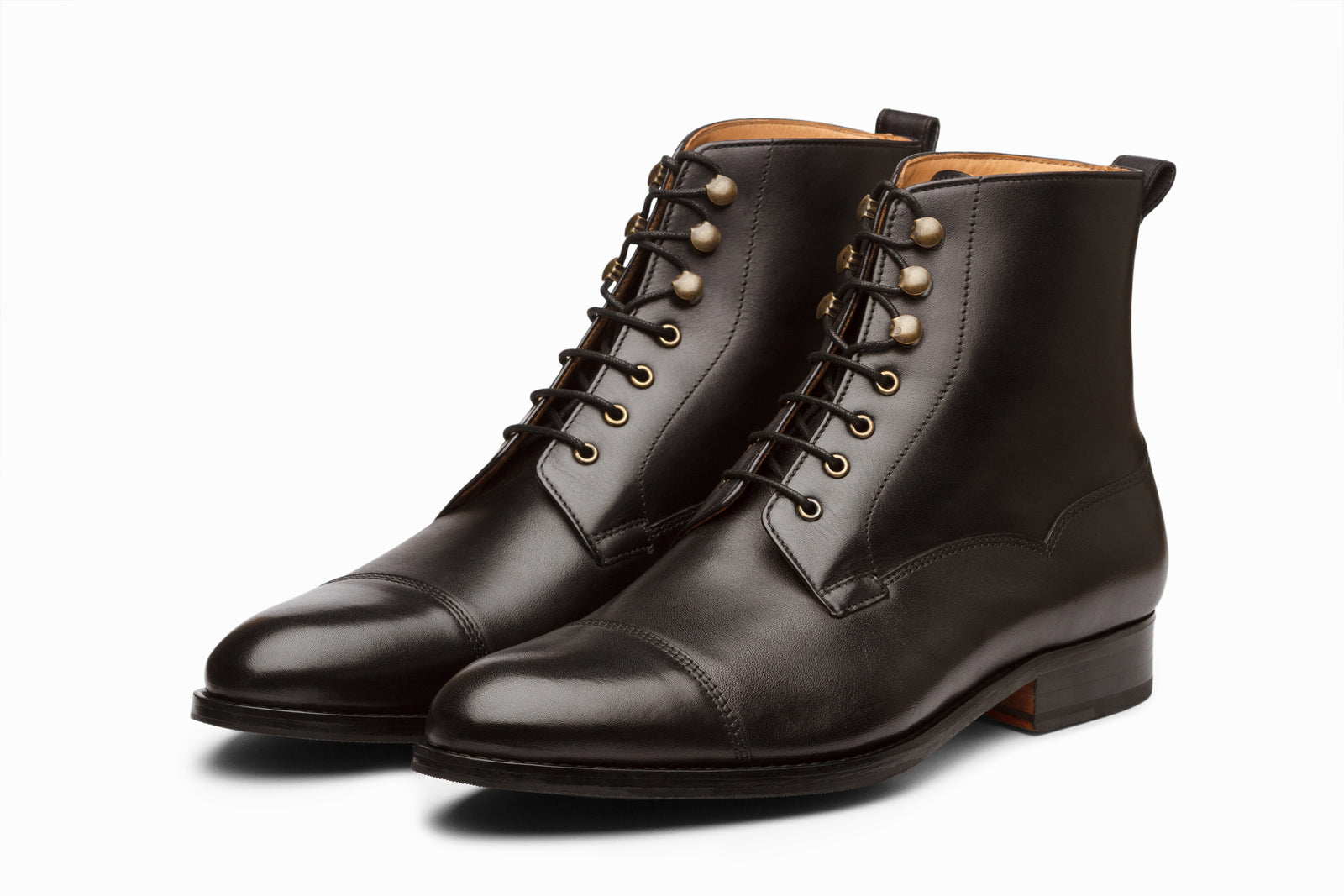 Black leather boot viewed in full