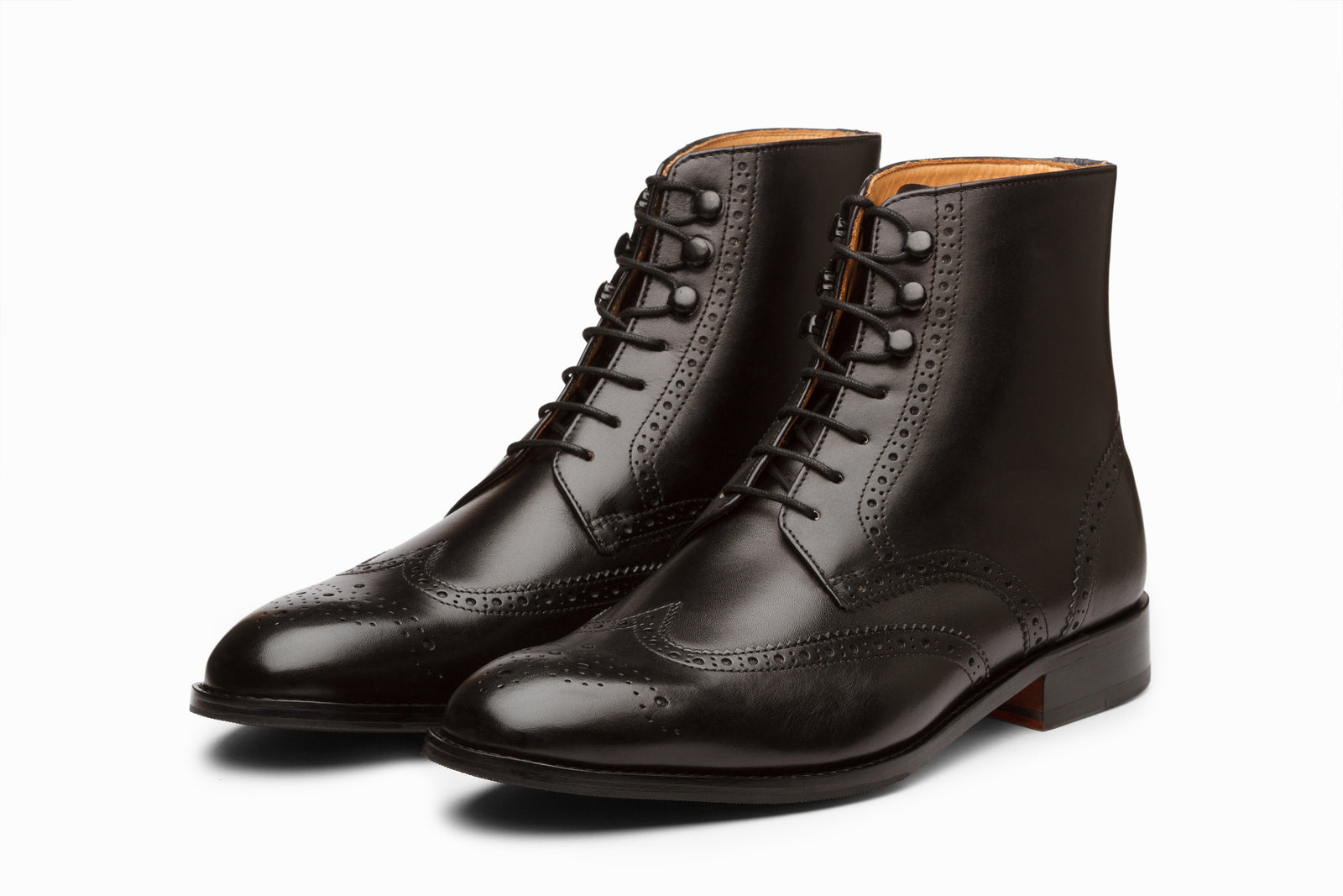 Black leather boot viewed in full