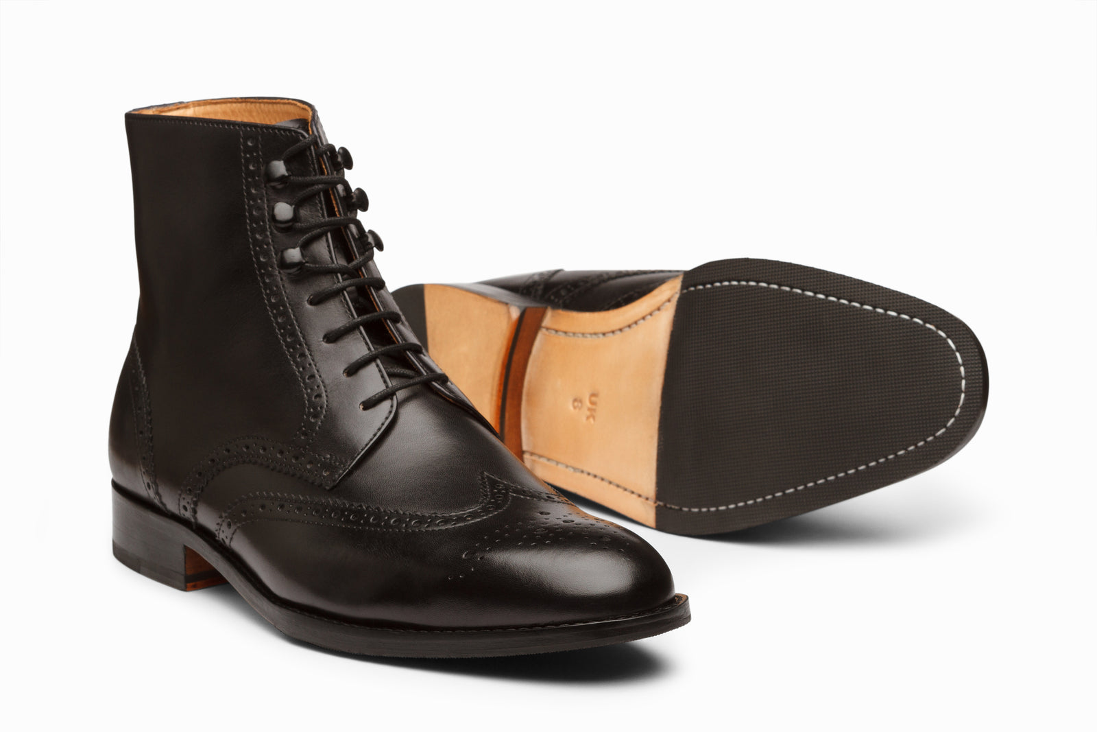 Close view of the black leather boot