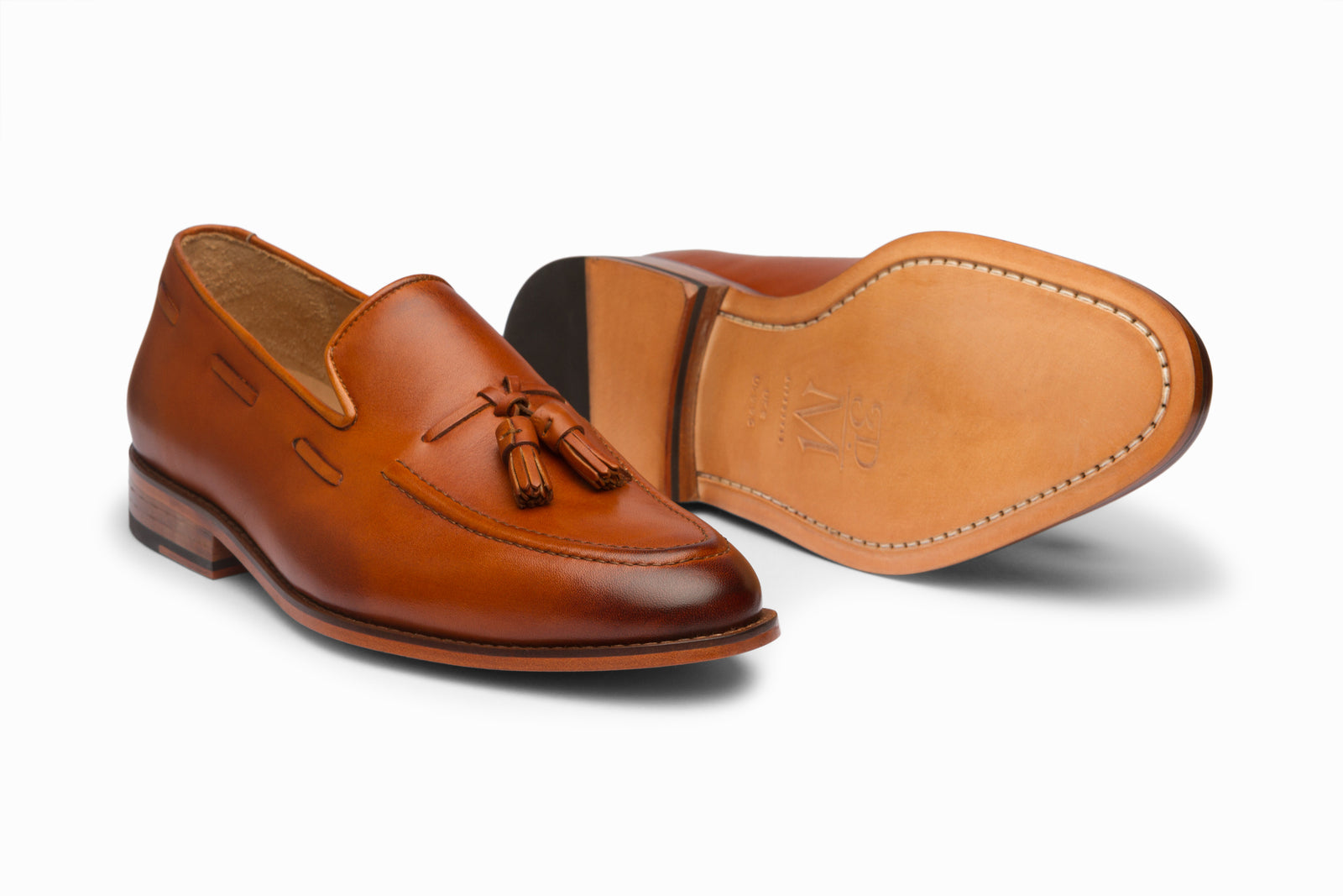 The tan leather tassel in detail