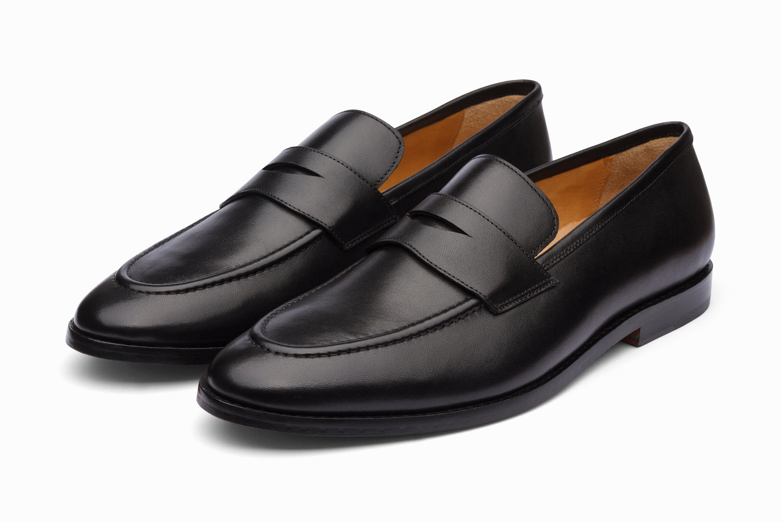 Black leather loafer viewed in full