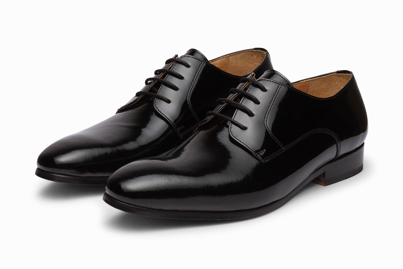 Black patent derby viewed in full