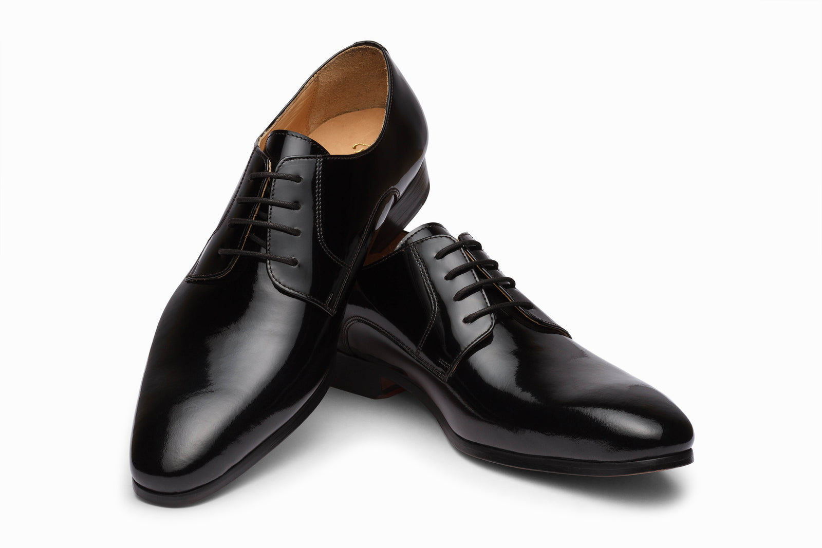Close view of the black patent derby