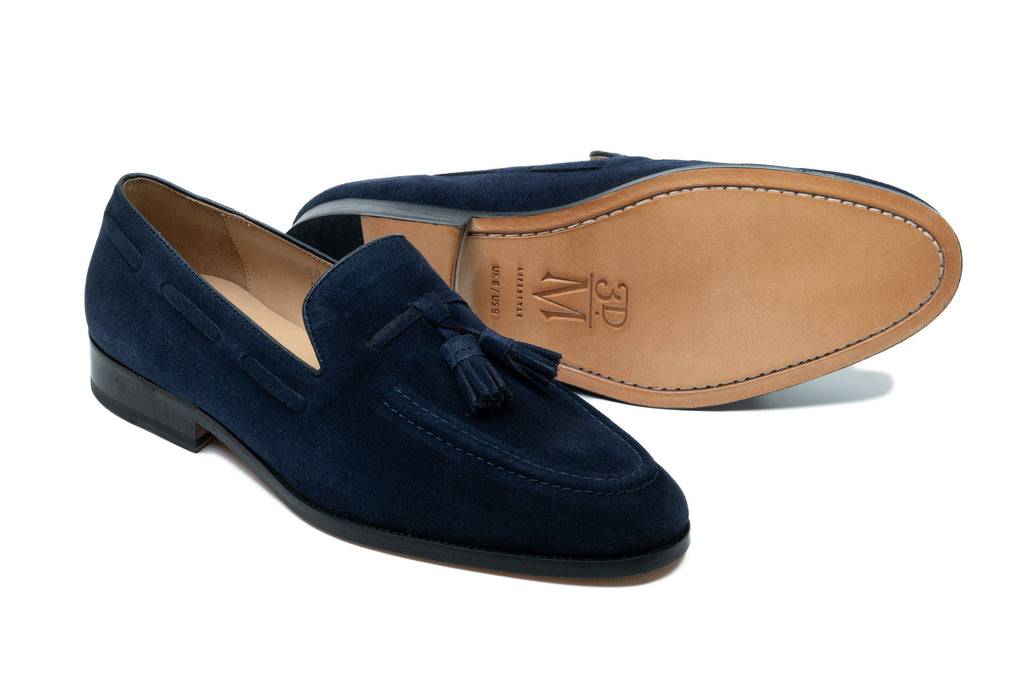 Close view of the navy suede tassel