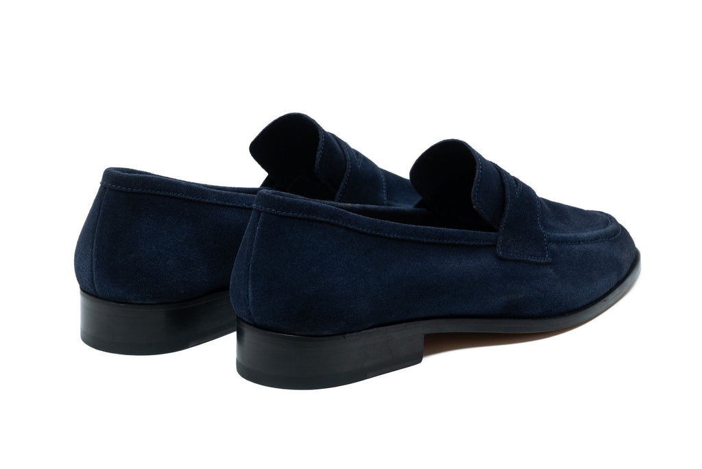 The navy suede penny in detail