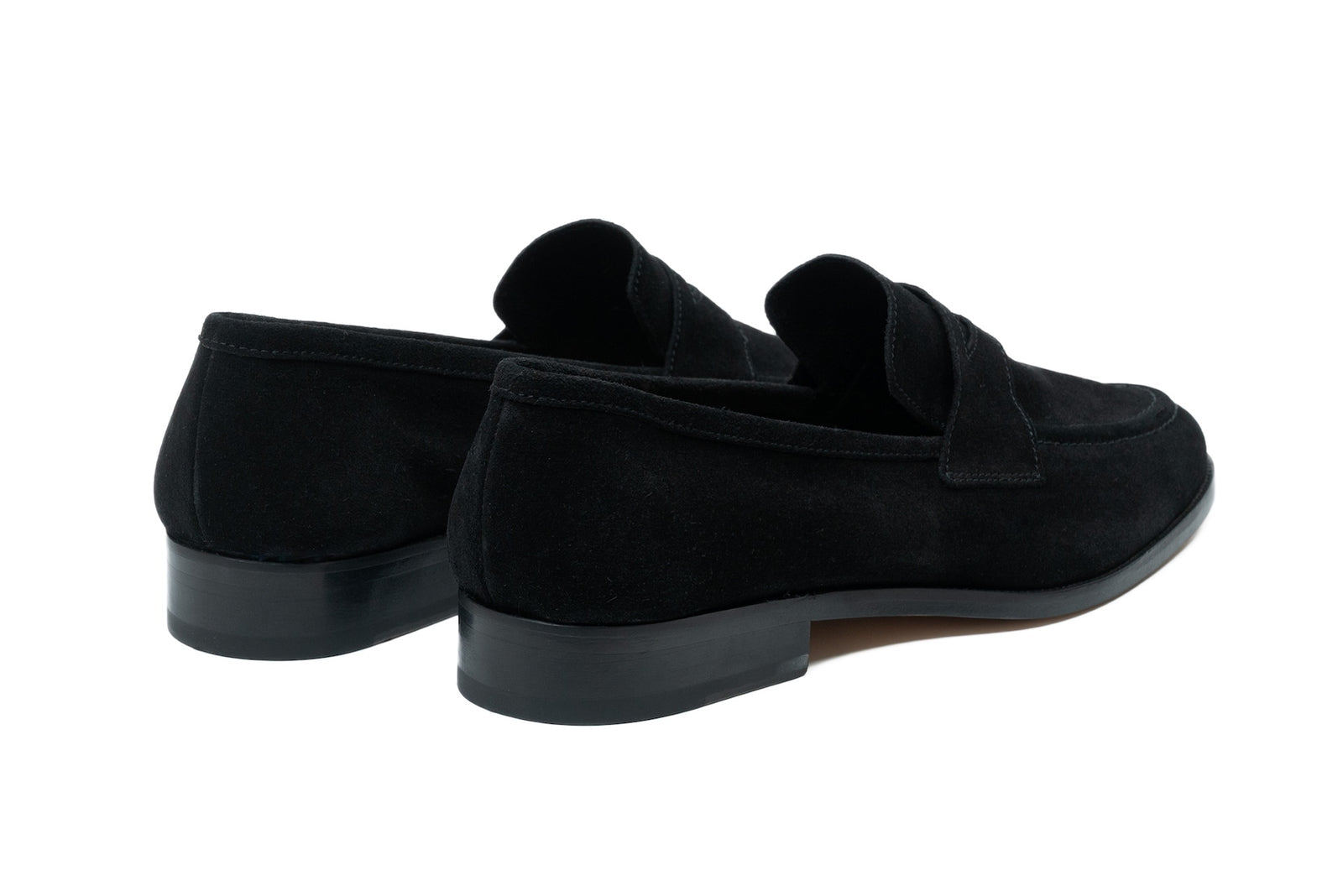 The black suede penny in detail