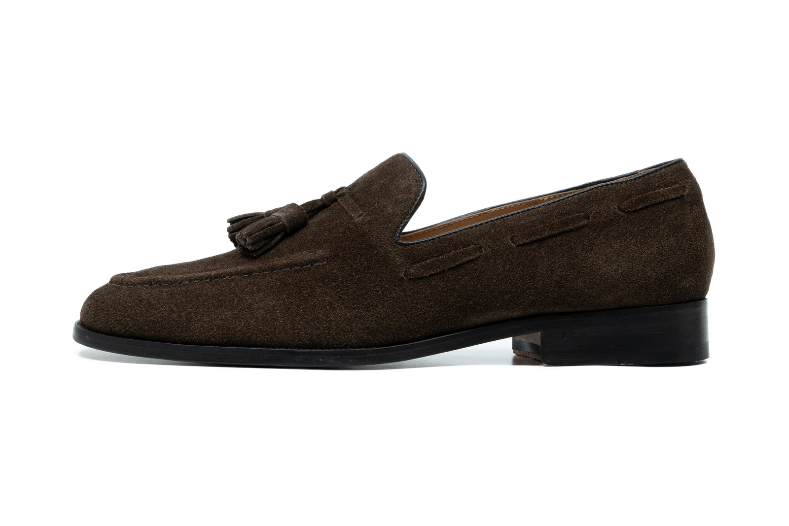 The brown suede tassel in detail