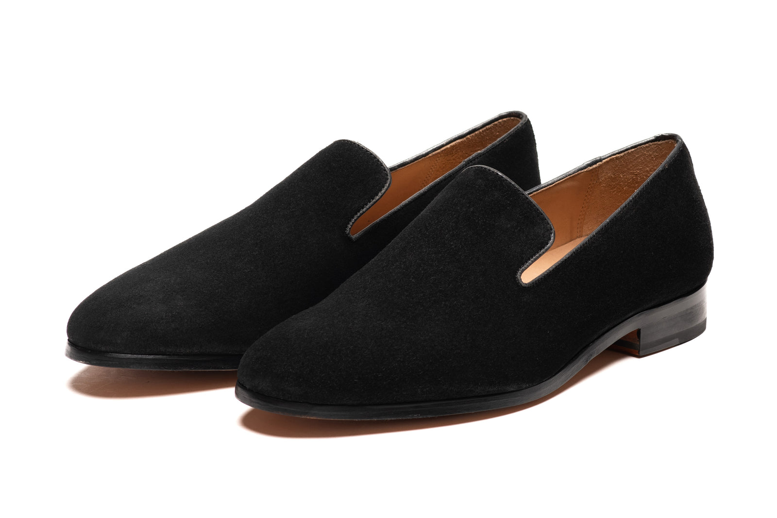 Black suede loafer viewed in full