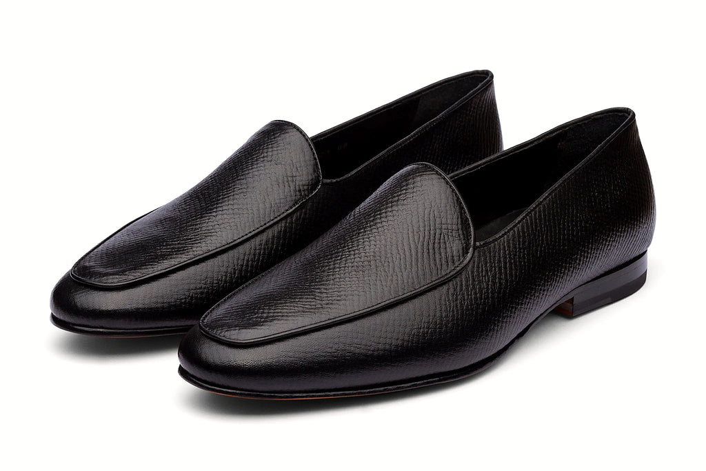 Pair of black grain loafer