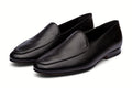 Pair of black grain loafer