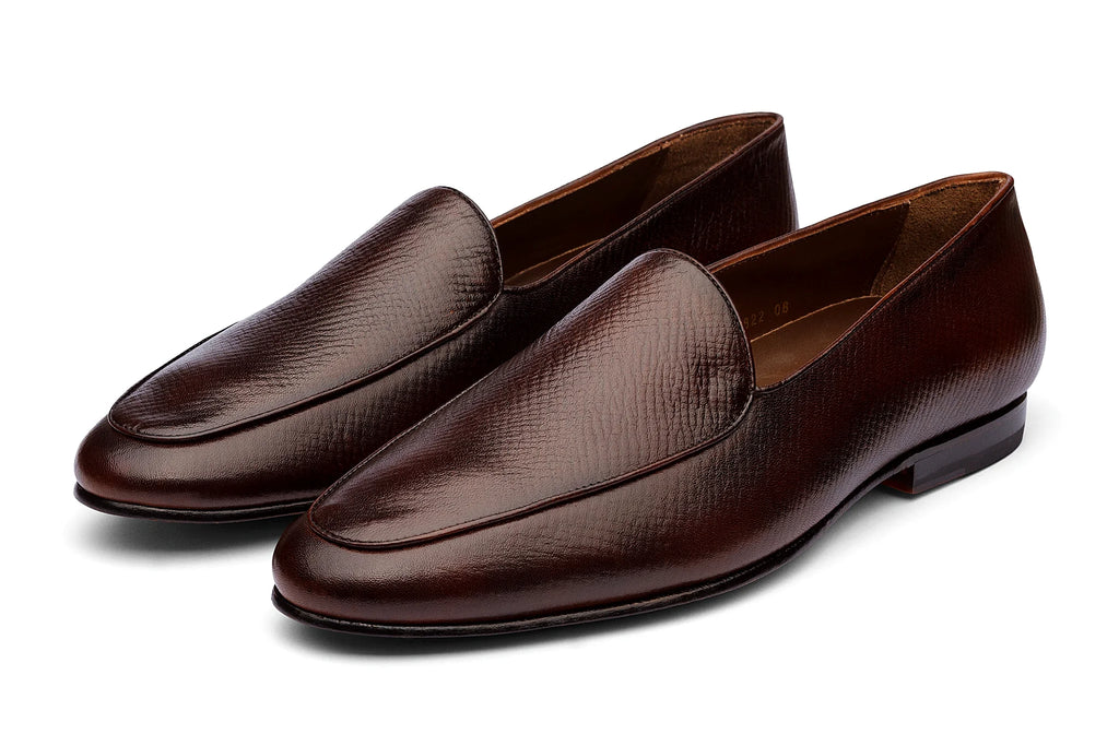 Pair of brown grain loafer