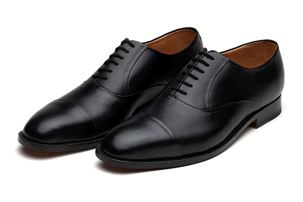 Pair of black leather oxford