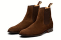 Pair of brown suede boot