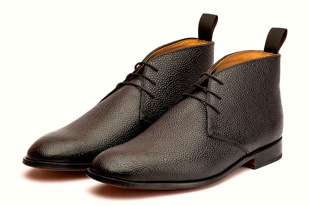 Pair of black grain boot