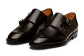 Pair of black leather monkstrap