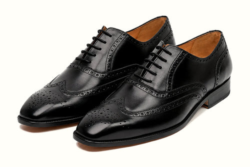 Pair of black leather oxford