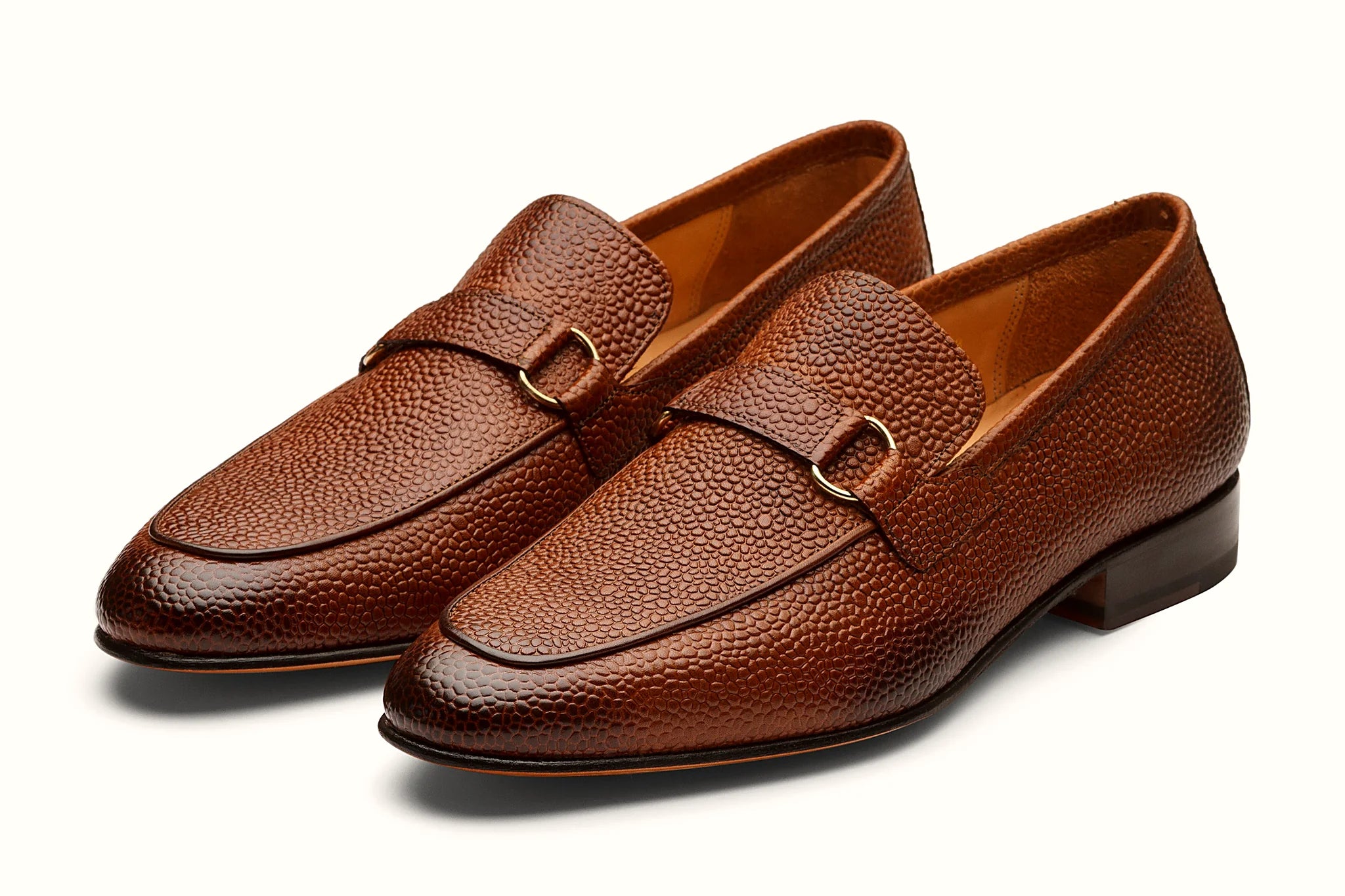 Pair of brown leather loafer