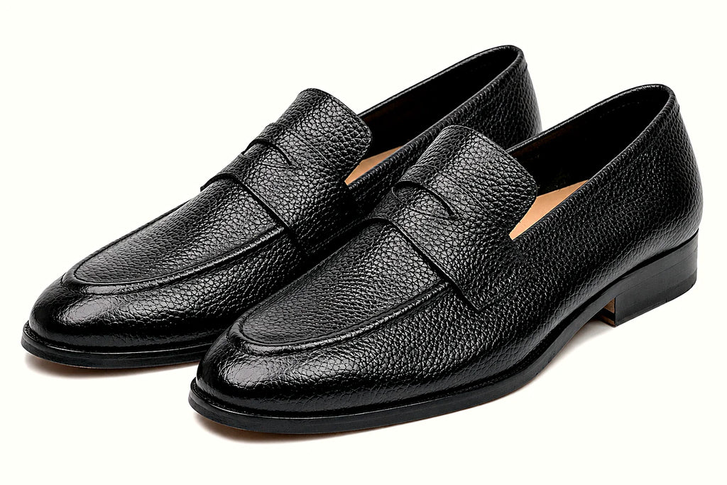 Pair of black leather penny