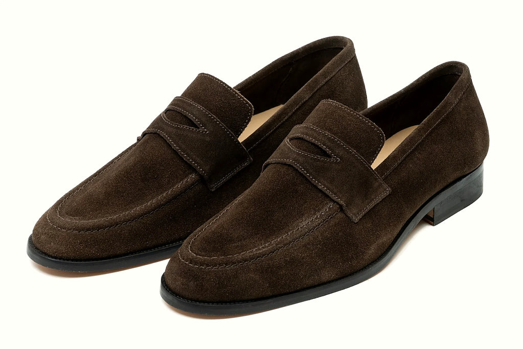 Pair of brown suede penny