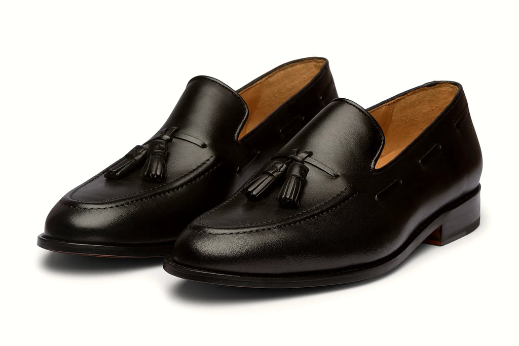 Pair of black leather tassel