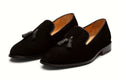 Pair of black suede tassel