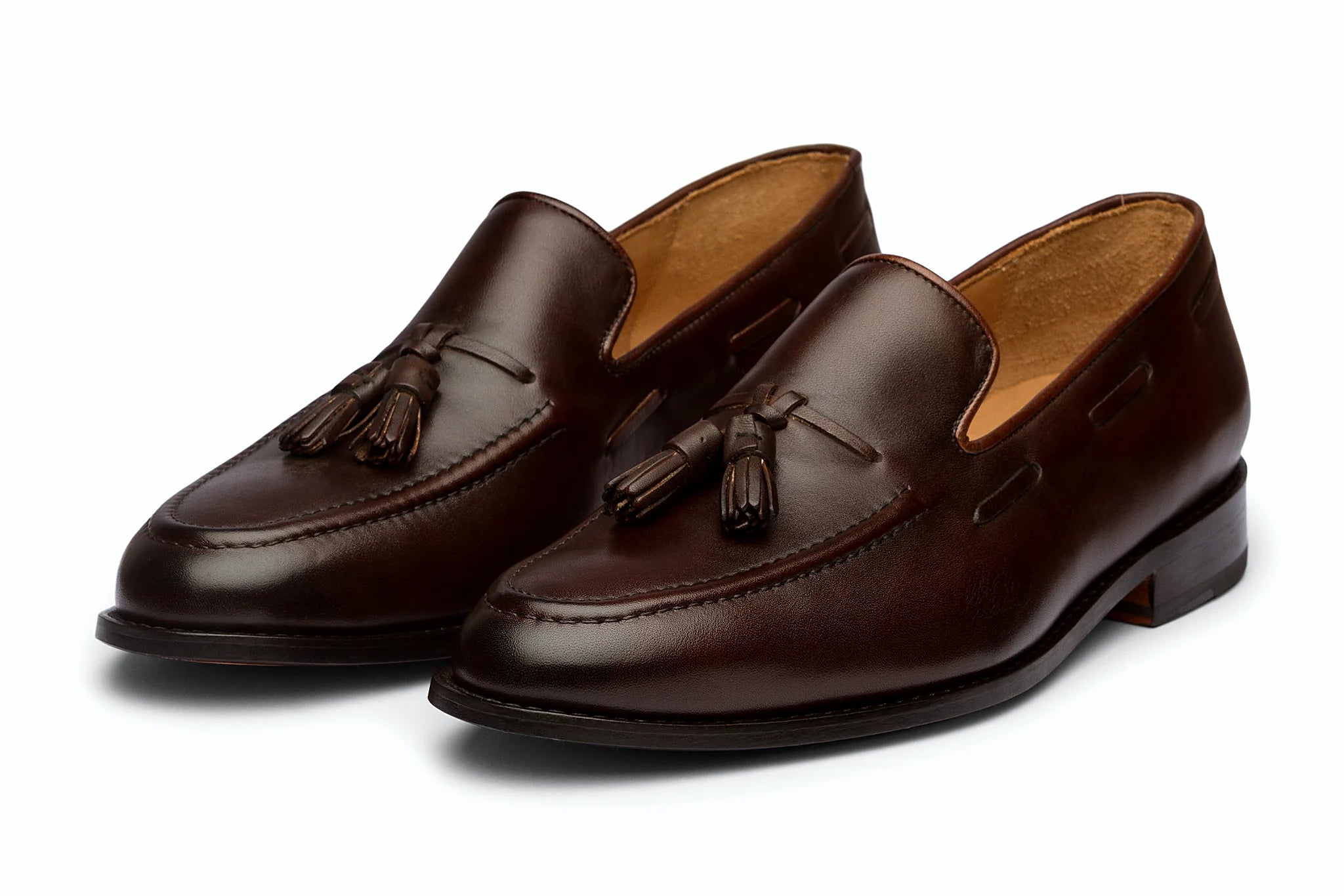 Pair of brown leather tassel