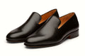 Pair of black leather loafer