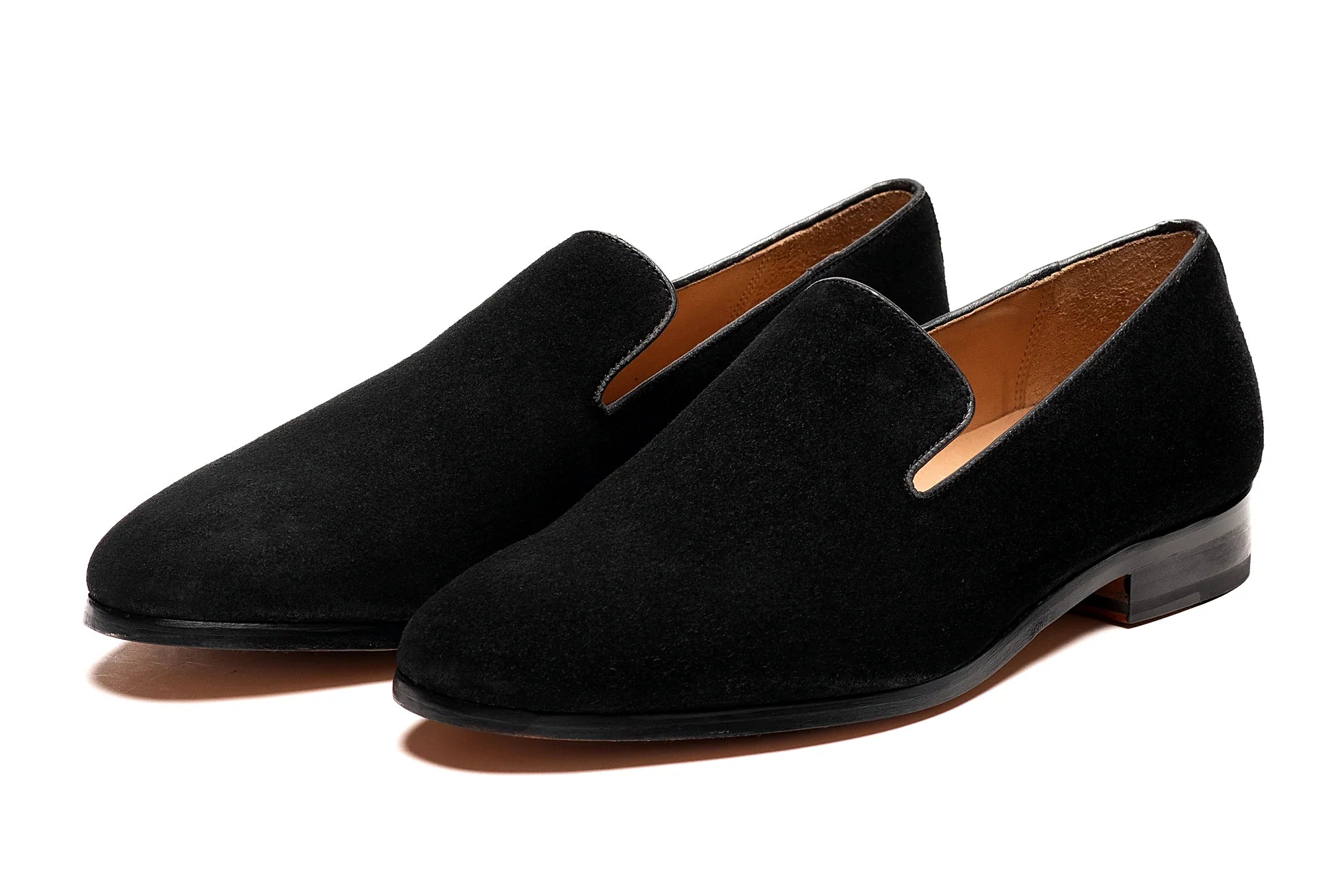Pair of black suede loafer