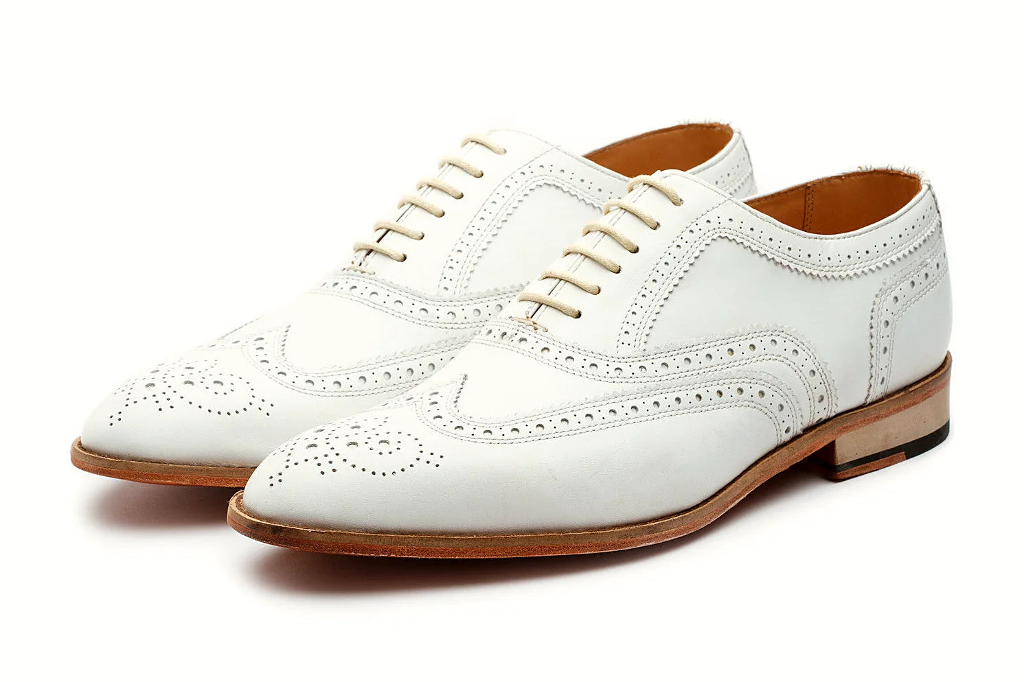 Pair of white leather oxford